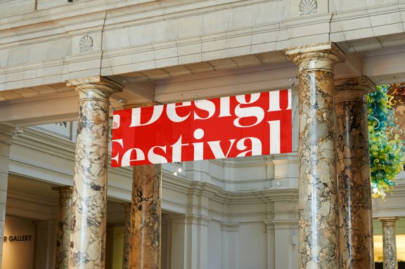 Flexible branding for the Design Festival, banner hung between pillars.