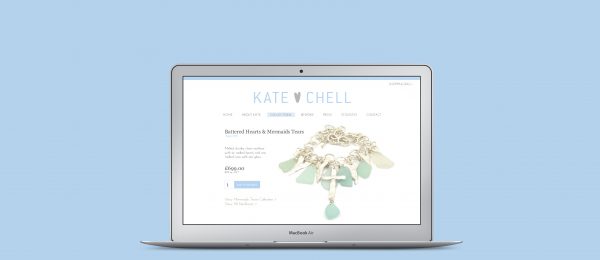 Macbook displaying website product page for Kate Chell jewellery, a battered hearts and mermaid tears necklace.