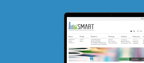 Macbook displaying SMART research homepage, a research group based out of Loughborough University.