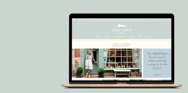 White Rabbit website gallery page on macbook